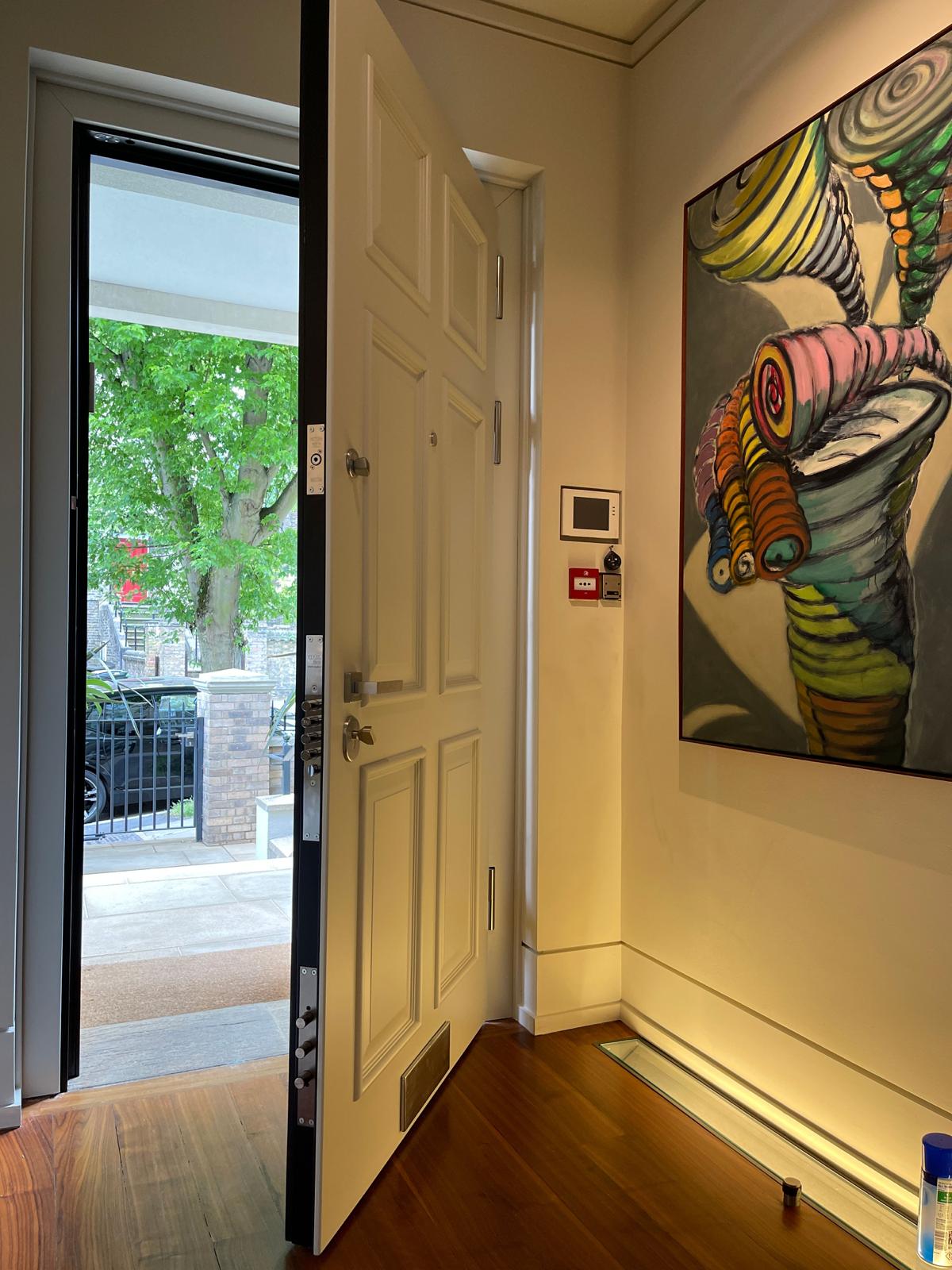 Painted solid panel front door installed on an Essex home — project 3