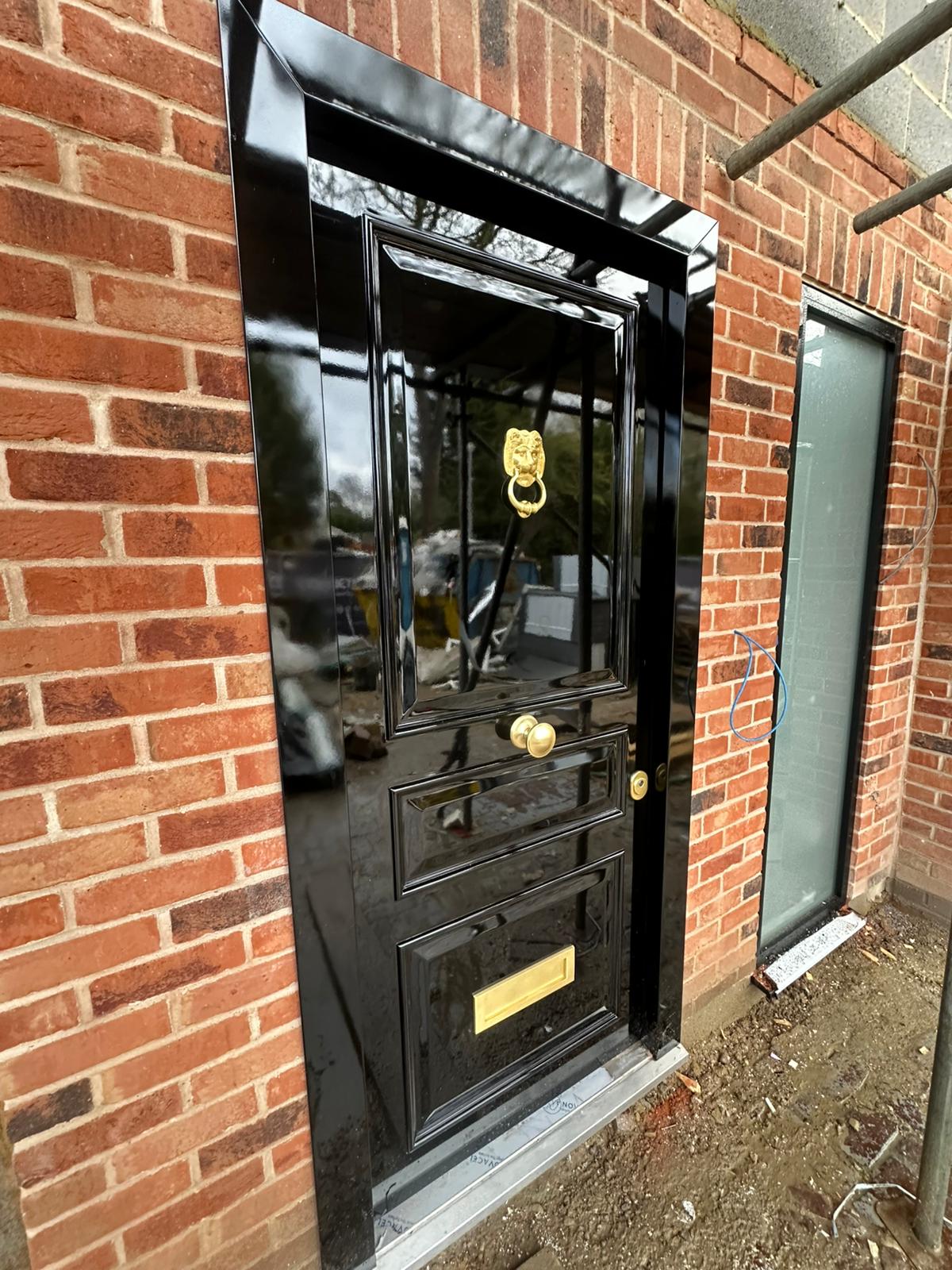 Painted solid panel front door installed on an Essex home — project 4